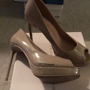 Chinese Laundry peep toe pumps. Wear on front side of shoes and heels.